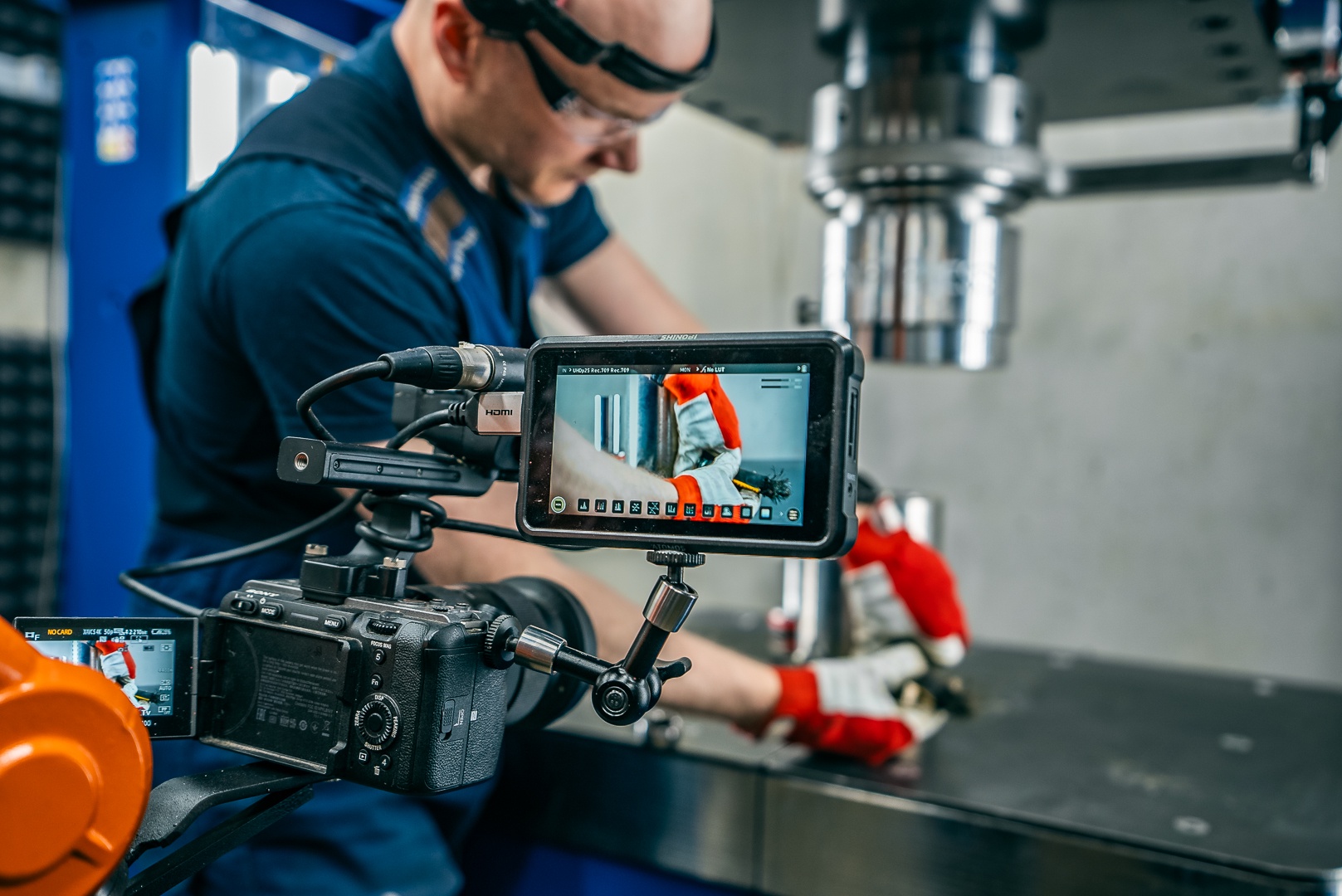 Lauri Vuohensilta filming the result of crushing with the hydraulic press